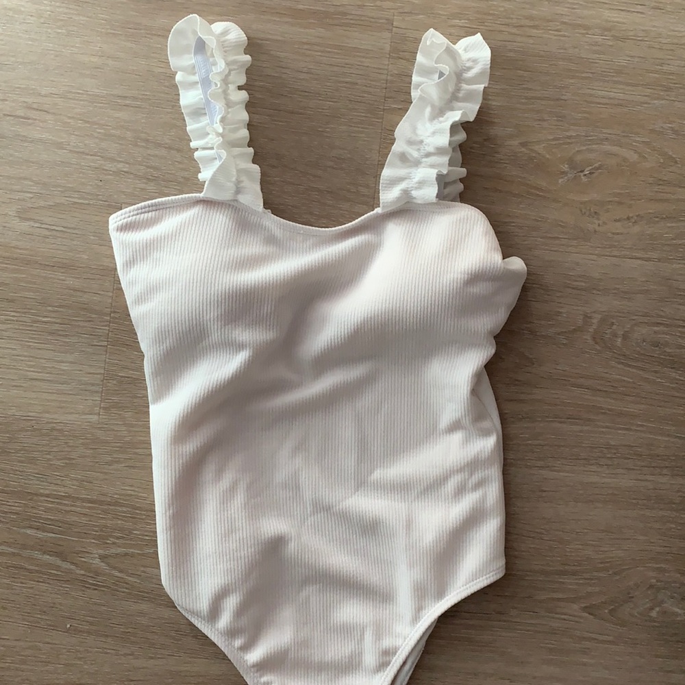 White ruffle sleeved shirt